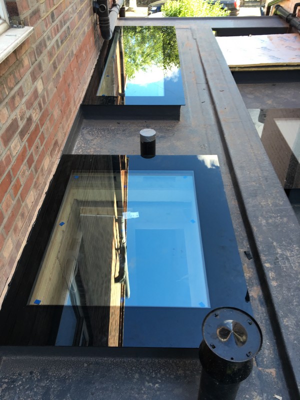 Multiple flat roof skylights on extension in Chesham
